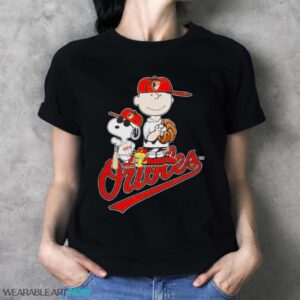 The Peanuts Snoopy Charlie Brown Baltimore Orioles 2024 MLB Star Shirt - Ladies T-Shirt