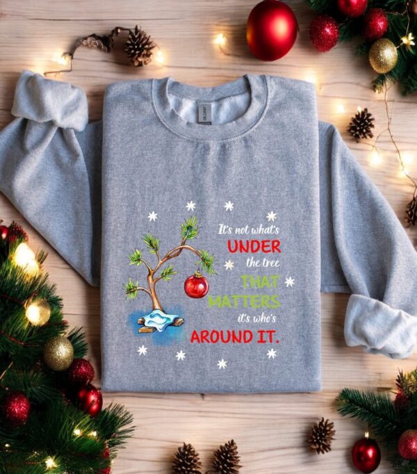 It's Not What's Under The Tree That Matters Christmas Sweatshirt Product Photo 1