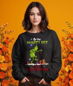 On The Naughty List And I Regret Nothing Grinch Christmas Shirt Product Photo 2