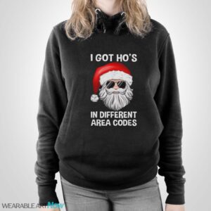 Santa claus I got ho’s in different area codes Christmas sweater - Unisex Pullover Hoodie