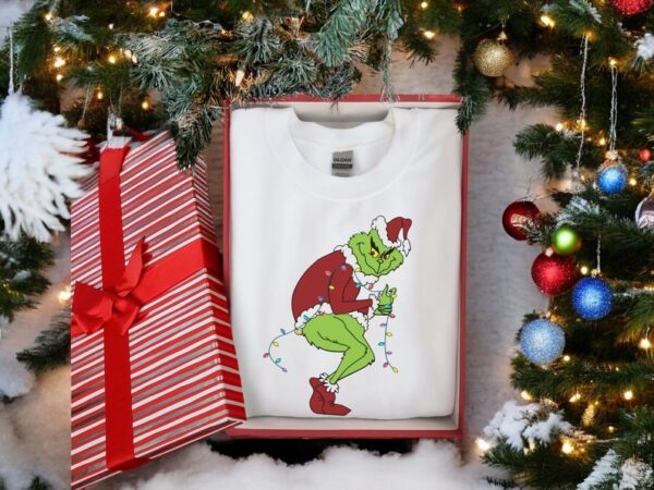 The Grinch Stealing Christmas Lights Sweatshirt Product Photo 1