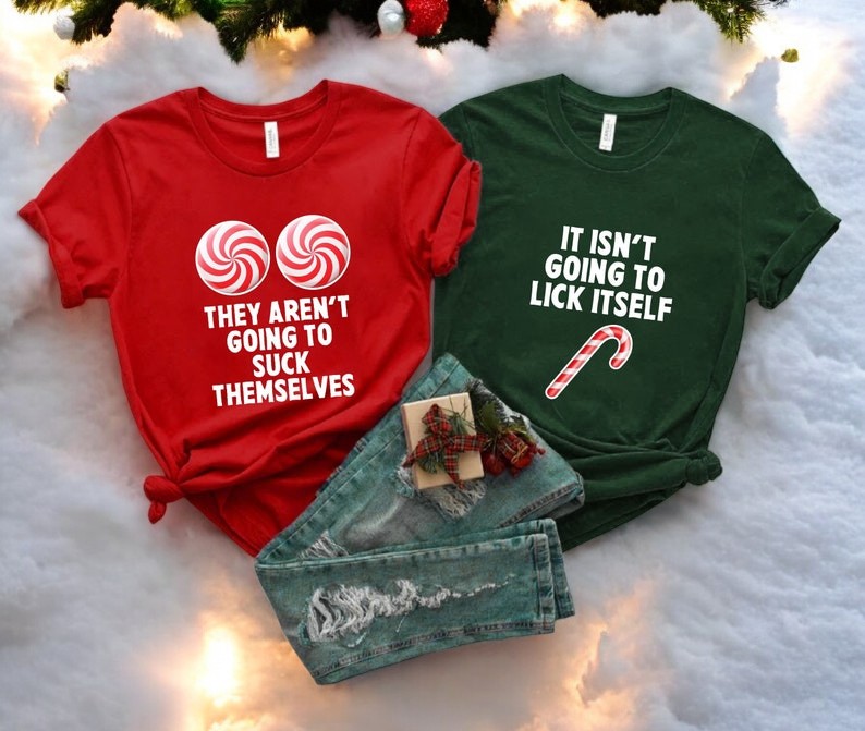 They Aren’t Going To Suck Themselves & It Isn’t Going To Lick Itself Matching Christmas Couple Shirt Product Photo 2