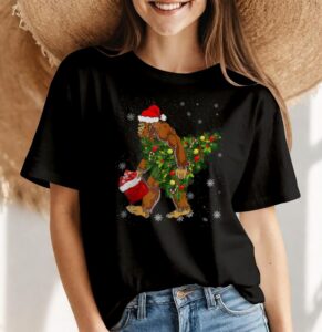 Bigfoot Carrying Christmas Tree Sasquatch Believer Shirt Product Photo 4